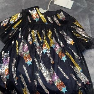Brand new Gucci girls dress 👗 size 6 gorgeous black has a slip multi color seq.